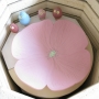 Glazed poppy ready for firing in the kiln
